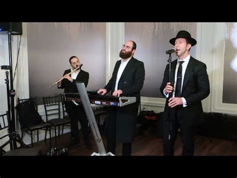 Shmuly Schneider singing at outdoor chupa .